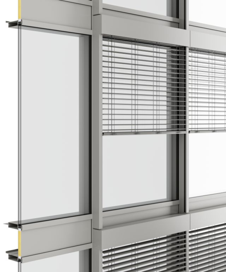 Detail van de Roma buitenjaloezie F50 met naadloze integratie in glasvliesgevels. Dit ontwerp combineert strak design met optimale functionaliteit en biedt effectieve zonwering voor duurzame en moderne bouwprojecten